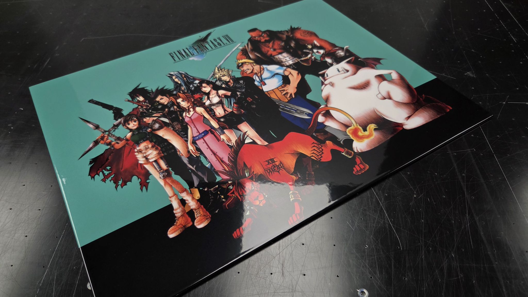 Finished Titan Forge metal panel of the Final Fantasy VII cast, photographed on the workshop bench