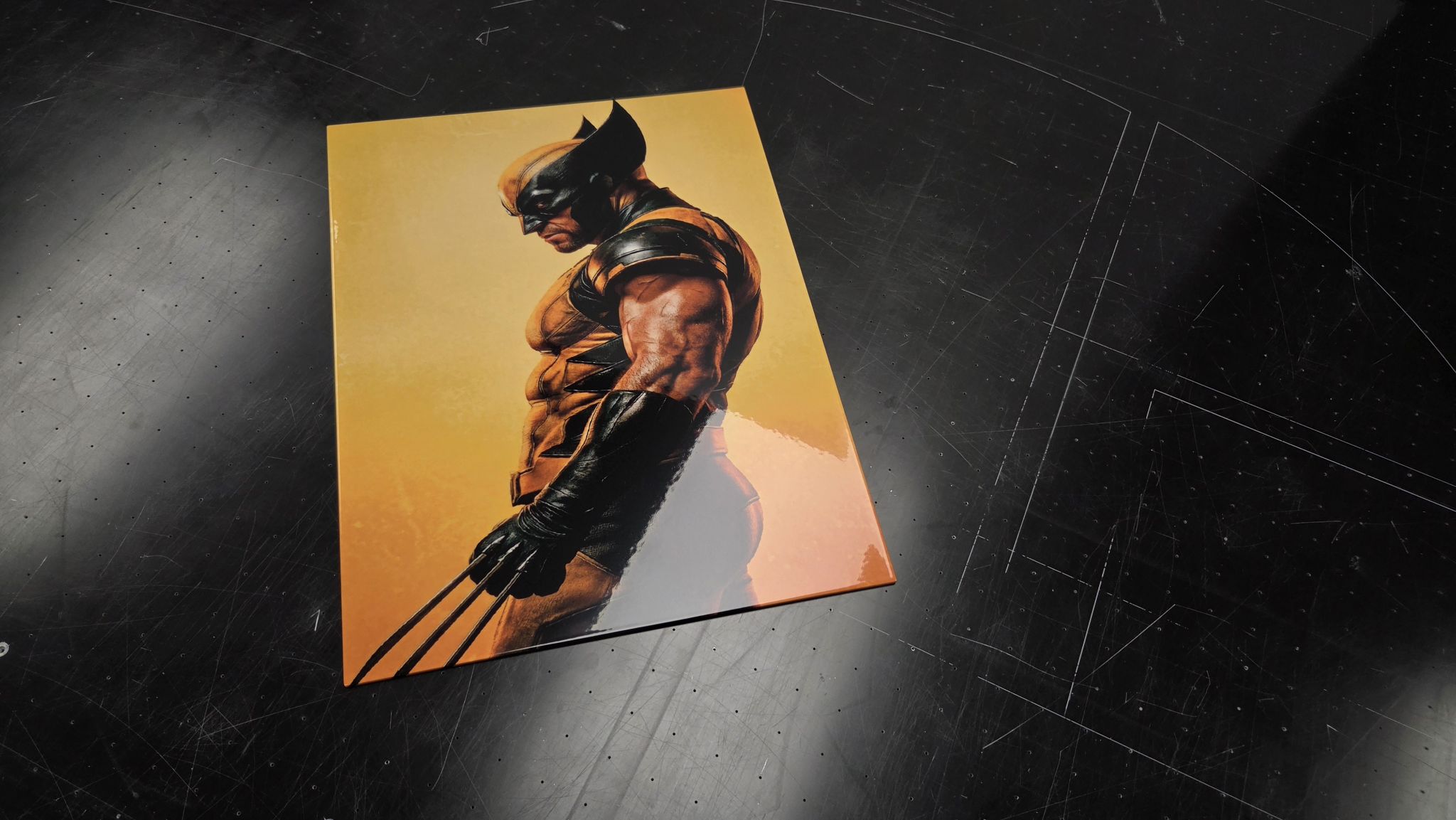 Finished Titan Forge metal panel of Wolverine, photographed on the workshop bench